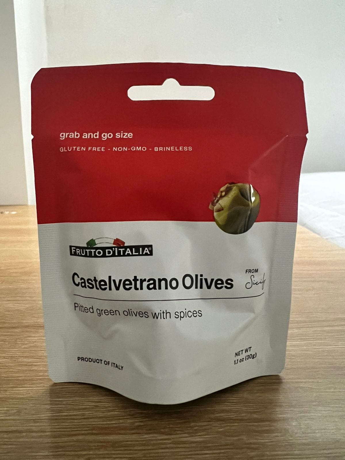 Pitted green olives with spices